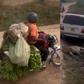 Netizens in shock as Okada rider carrying bunches bananas rides past lions safely