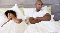 Sad couple in bed(Classic 105)