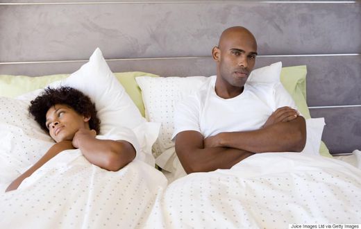 Sad couple in bed(Classic 105)