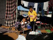 Powerful photos and stories from the caravan show migrants' harrowing journey to the US