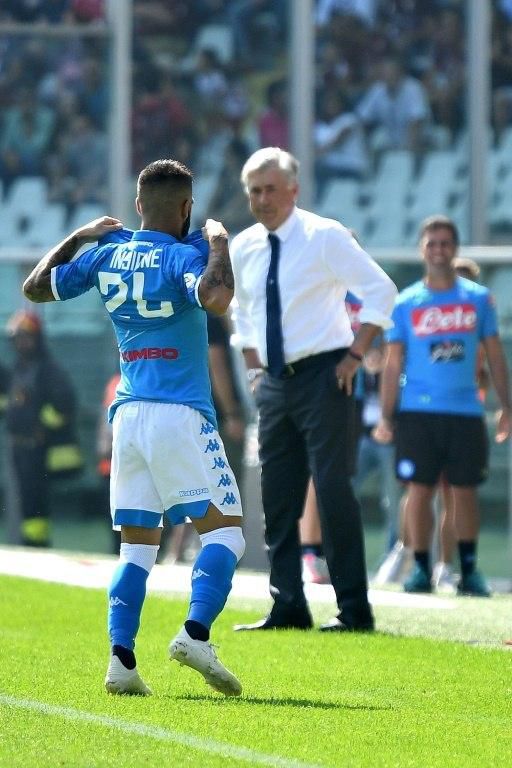 Carlo Ancelotti's Napoli are three points behind Juventus.