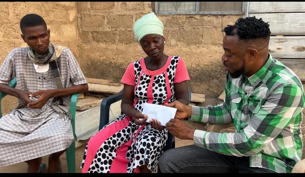 Corporal Simon Agbeko and Emmanuel Ohene and his mother