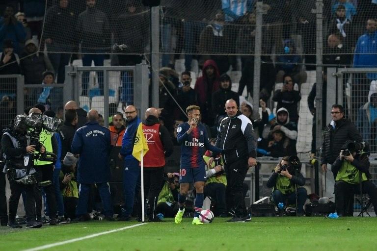 Play was held up more than once during the game as objects were thrown at Neymar