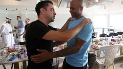Xavi in tears as he bids emotional farewell to Andre Ayew ahead of Barcelona move
