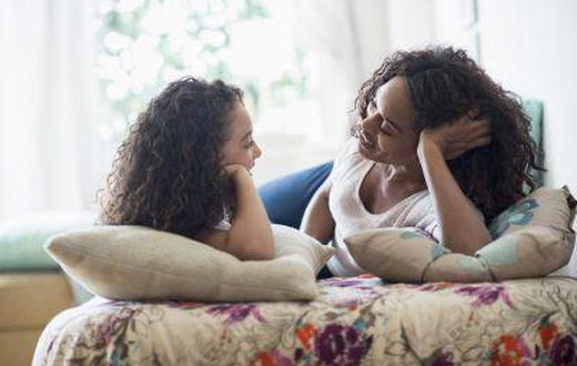 Mother and daughter conversing