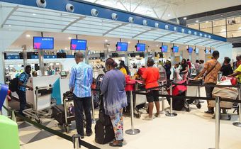 Passengers at Kotoka Airport Ghana (kuulpeeps)