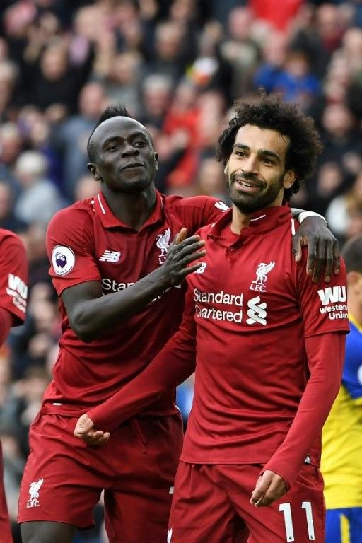 Liverpool's Mohamed Salah celebrates his third goal of the season