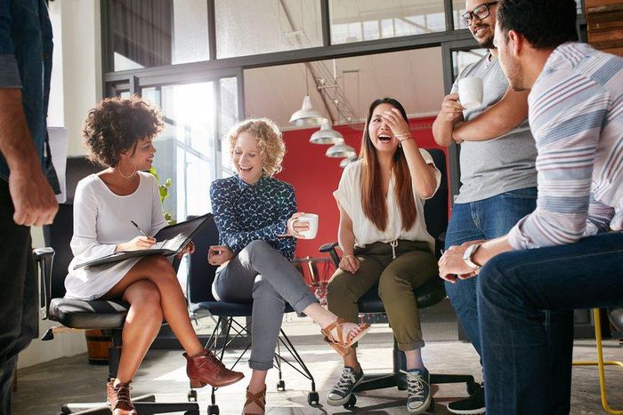 meeting laughing colleagues team happy