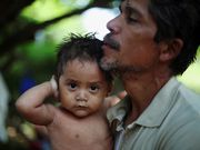 Powerful photos and stories from the caravan show migrants' harrowing journey to the US