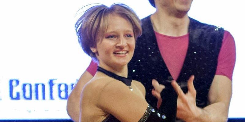 Katerina Tikhonova (L), daughter of Russian President Vladimir Putin, dances with Ivan Klimov during the World Cup Rock'n'Roll Acrobatic Competition in Krakow, Poland April 12, 2014. Picture taken April 12, 2014. REUTERS/Jakub Dabrowski