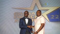 Frank Anwelle, Country Manager for DPO Pay receiving the award from Martin Kwame Awagah, organizer of the event
