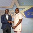 Frank Anwelle, Country Manager for DPO Pay receiving the award from Martin Kwame Awagah, organizer of the event