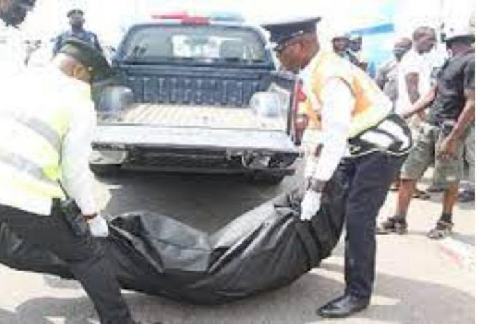 Police carrying dead body