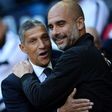 Pep Guardiola greets Brighton manager Chris Hughton prior to Manchester City's 2-0 win at home to the Seagulls on Saturday