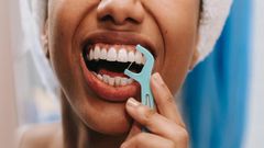 Flossing gets rid of food and plaque between your teeth