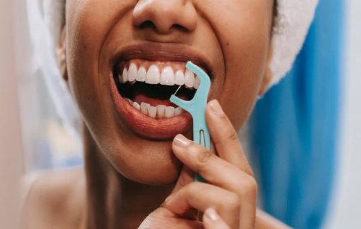 Flossing gets rid of food and plaque between your teeth