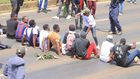 Protesters stage a sit-in along Thika Road demanding justice for the late Denzel Omondi who disappeared on June 25 and his body was later discovered in a Juja quarry [Image Credit: Tobiko Abraham]