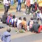Protesters stage a sit-in along Thika Road demanding justice for the late Denzel Omondi who disappeared on June 25 and his body was later discovered in a Juja quarry [Image Credit: Tobiko Abraham]