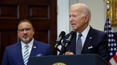 U.S. President Joe Biden is joined by Education Secretary Miguel Cardona (L).Chip Somodevilla/Getty Images