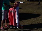 Powerful photos and stories from the caravan show migrants' harrowing journey to the US