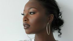 A woman with elegant earrings