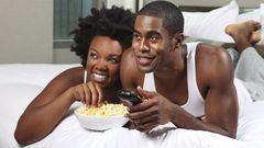 Black couple watching a movie