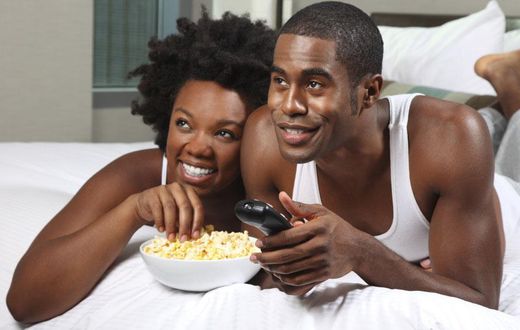 Black couple watching a movie