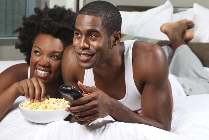 Black couple watching a movie