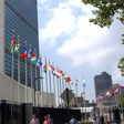 This July 27, 2007 file photo shows the United Nations Headquarters building in New York. Two Myanmar citizens have been arrested on charges alleging that they conspired to oust Myanmar's ambassador to the United Nations by injuring or killing him. U.S...