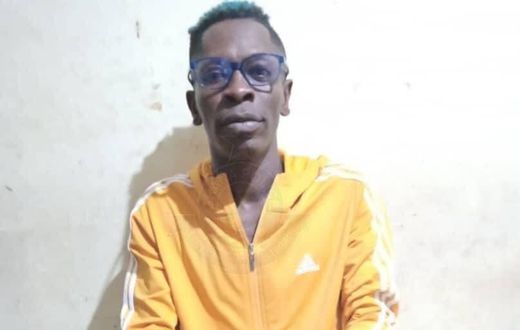 Shatta Wale in handcuffs