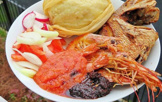 Ga kenkey served with pepper and fish