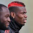 Romelu Lukaku (left) and Paul Pogba (right) were both dropped to the bench for Manchester United's clash with Arsenal on Wednesday