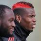 Romelu Lukaku (left) and Paul Pogba (right) were both dropped to the bench for Manchester United's clash with Arsenal on Wednesday