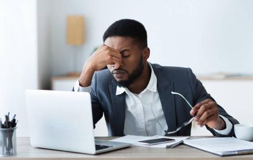 Tired man in an office