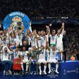 Sergio Ramos lifts last season's Champions League trophy alongside his Real Madrid teammates in Kiev