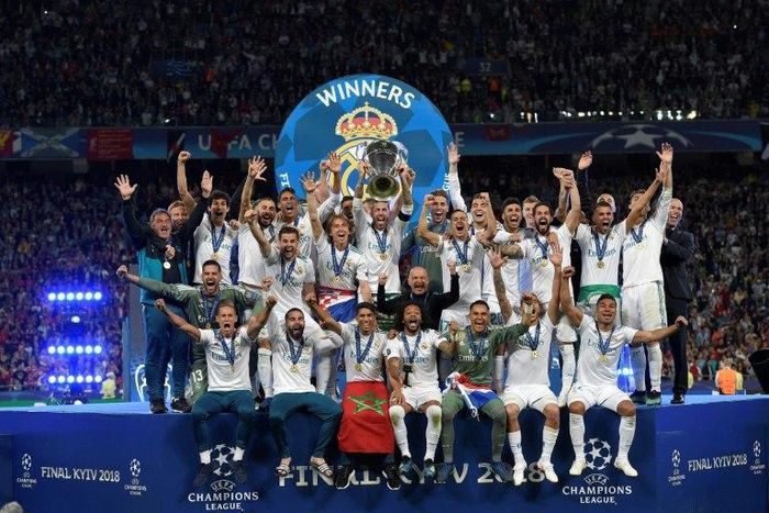 Sergio Ramos lifts last season's Champions League trophy alongside his Real Madrid teammates in Kiev