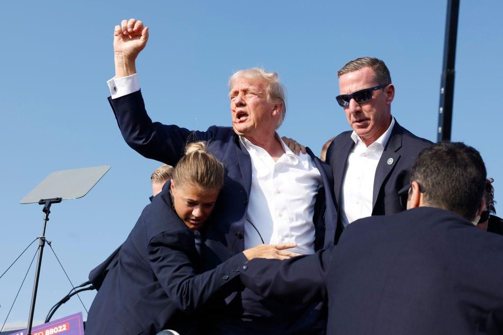 Secret Service agents rushing former President Donald Trump offstage during a rally in Butler, Pennsylvania.Anna Moneymaker/Getty Images