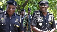 IGP Dampare congratulates COP Yohonu on his promotion to Deputy IGP