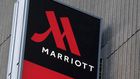 Signage for the New York Marriott Marquis is seen in Manhattan, New York, November 16, 2015. REUTERS/Andrew Kelly