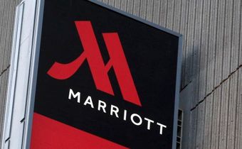 Signage for the New York Marriott Marquis is seen in Manhattan, New York, November 16, 2015. REUTERS/Andrew Kelly