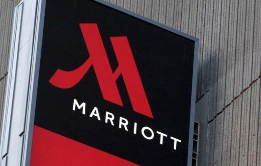 Signage for the New York Marriott Marquis is seen in Manhattan, New York, November 16, 2015. REUTERS/Andrew Kelly