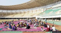 The making of Ibrahim Mahama "Purple Hibiscus" sewn at Tamale stadium and exhibited at the Barbican Center in London