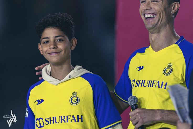 Ronaldo and his son at his unveiling for AL-Nassr