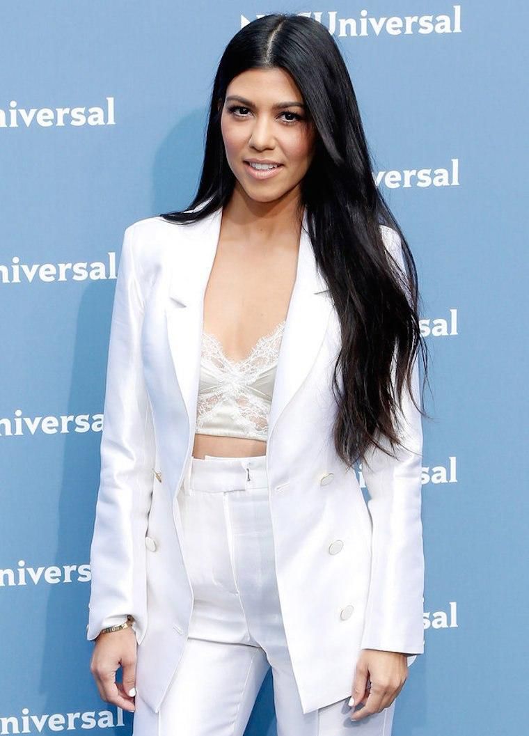Kourtney Kardashian in an all-white apparel.