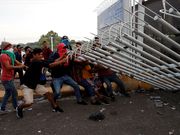 Powerful photos and stories from the caravan show migrants' harrowing journey to the US