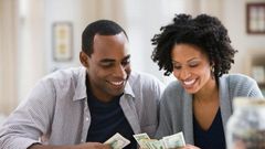 Couple counting money