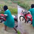 Akufo-Addo, we’re suffering – Nurses cry while pushing motorbike through stream