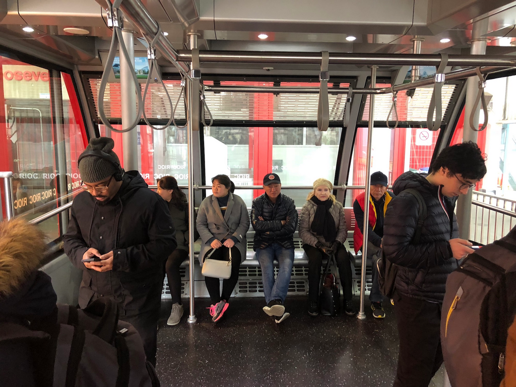One of New York City's most affordable tourist experiences is a tram that takes you 250 feet above the city for the price of a subway fare