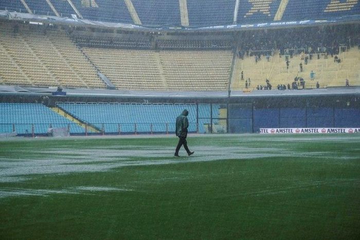 The final of the Copa Libertadores is postponed until Sunday after torrential rain drenches Buenos Aires