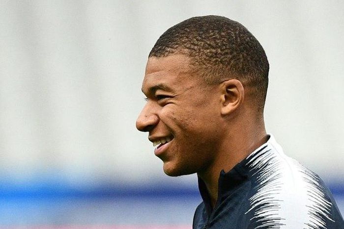 Kylian Mbappe is no big head says his coach Didier Deschamps